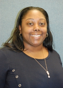 A portrait of a smiling woman