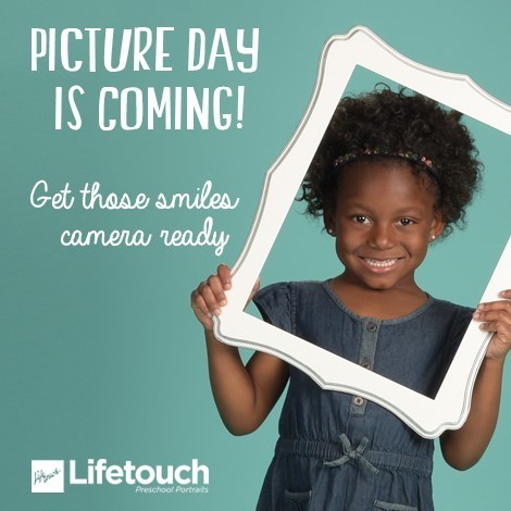 child holding frame around face